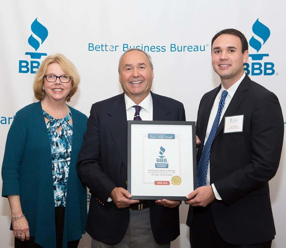 Richard and John Prunier receiving an award from the BBB