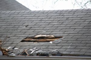 Damaged Shingle Roof Hole